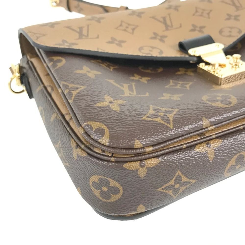 Pochette Métis Reverse Monogram canvas - Picture 4 of 14